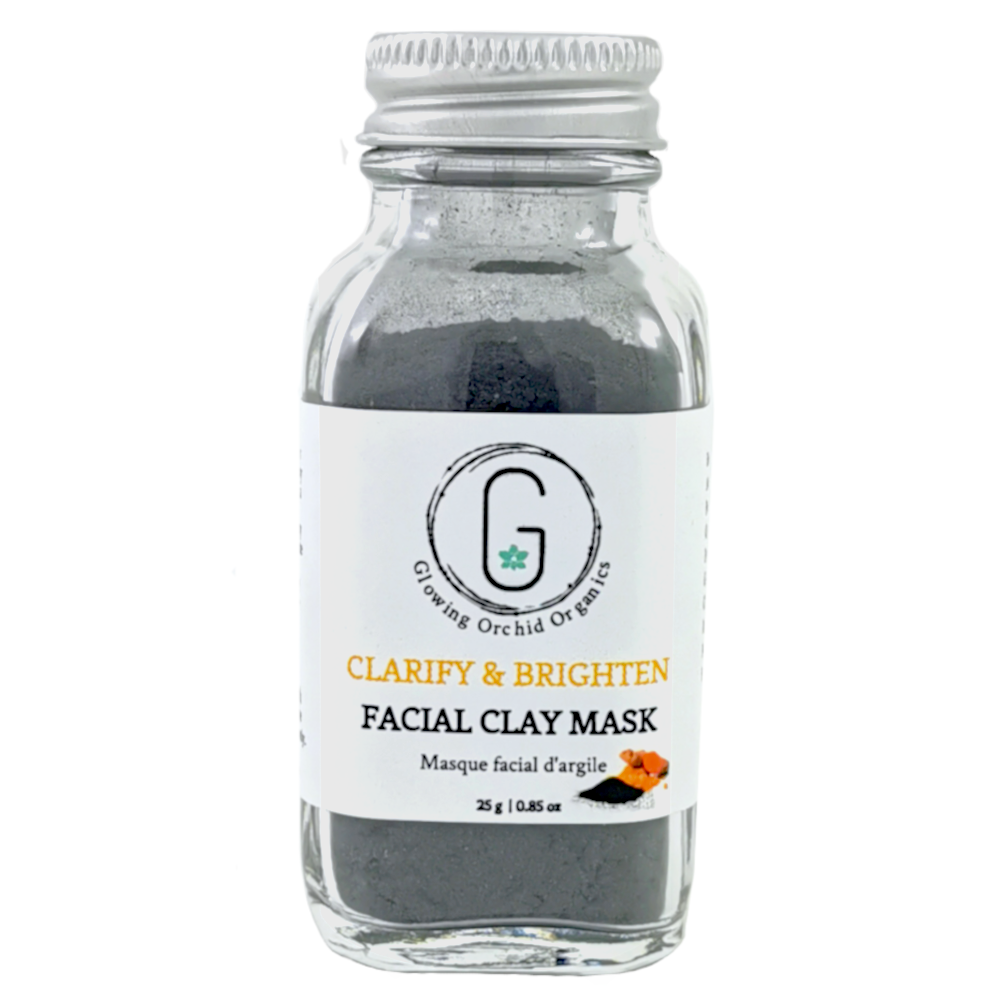 Charcoal & Turmeric (Clarifying & Brightening) Facial Clay Mask in Glass Bottle (40 g | 0.85 oz) Front Glowing Orchid Organics