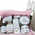Ultra Glow Bundle includes an assortment of glowing orchid products in gift box